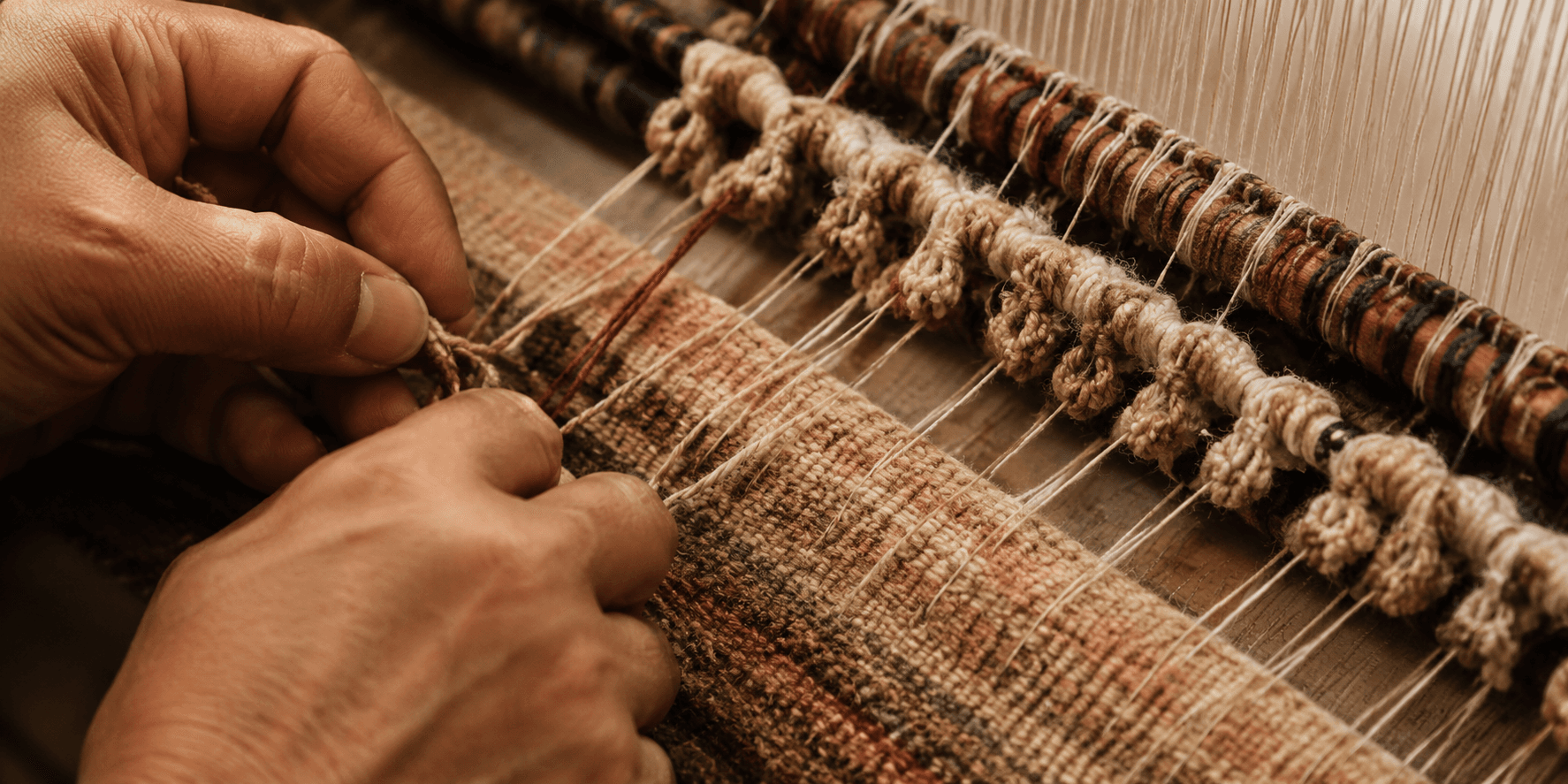 Precision loom weaving a Persian rug pattern